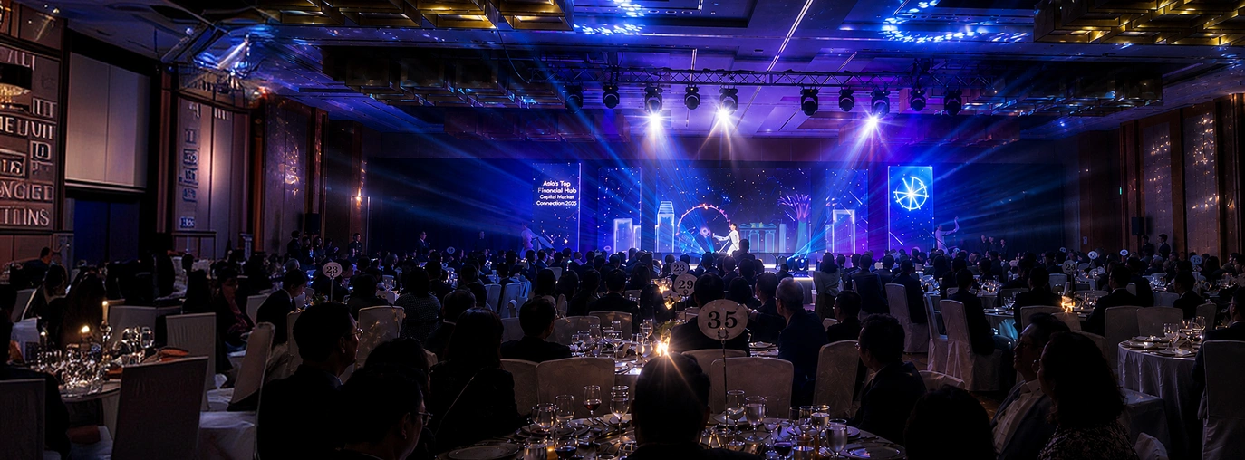 Grand ballroom corporate gala dinner in Singapore featuring stage lighting and LED video wall backdrop by Active Visual