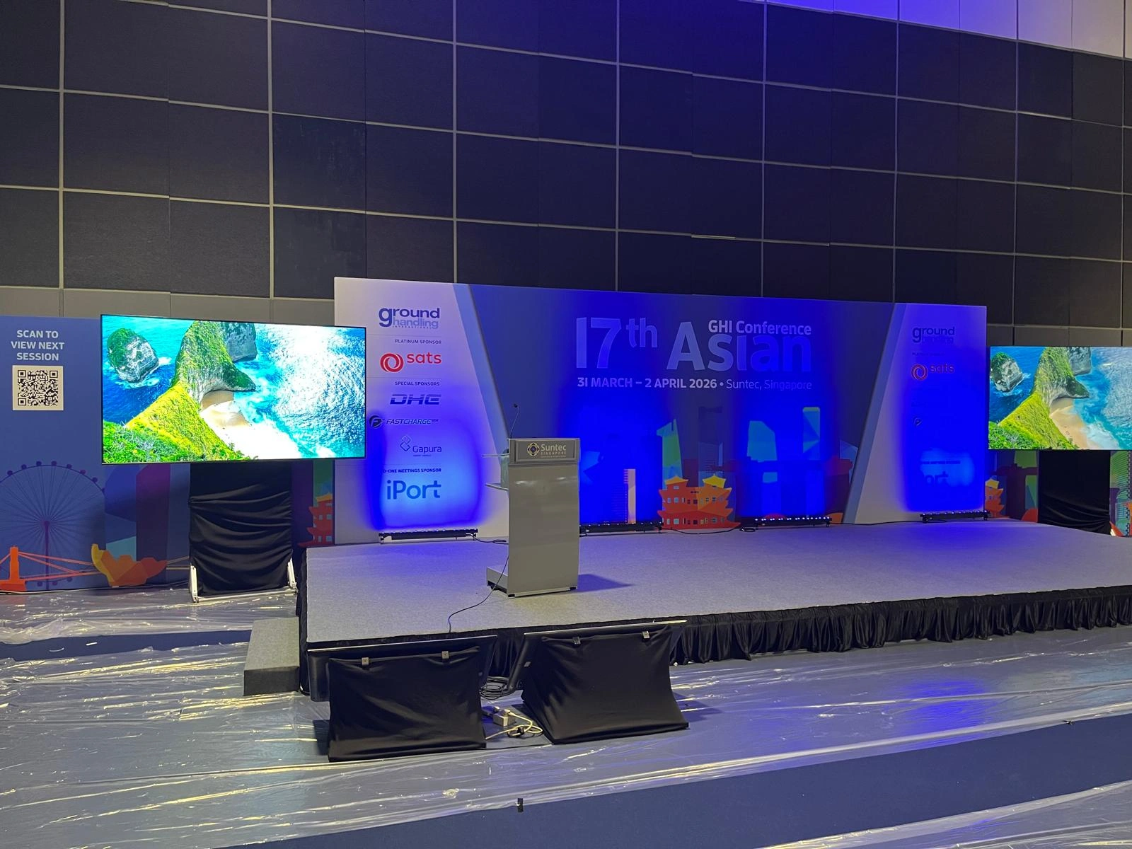 GHI Asian Conference Stage Setup with Dual TV Screens