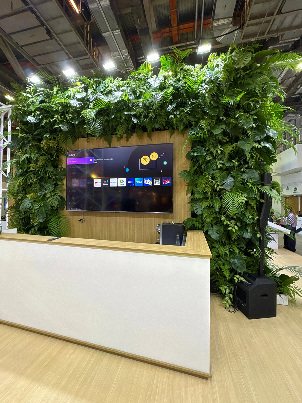 Foliage Green Wall Booth with Integrated TV Display