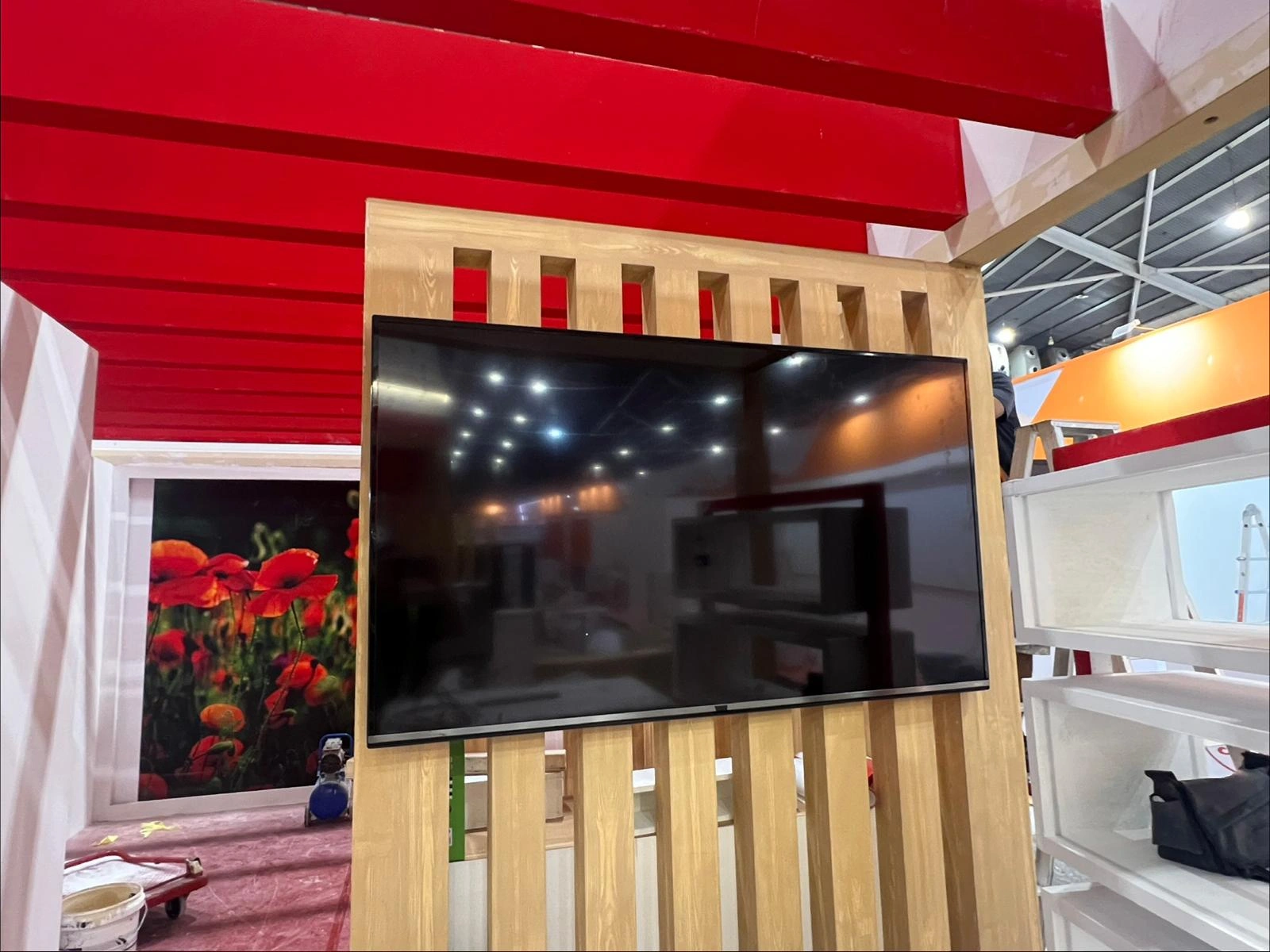 Wall-Mounted TV on Timber Slat Exhibition Panel